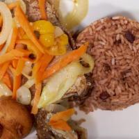 Jamaican Escovitch Fish · Spicy. Special. Wild caught red snapped fried to perfection and topped with pickled carrots,...
