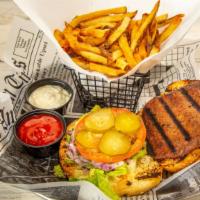 Impossible Burger · Vegetarian Impossible Burger. Lettuce, tomatoes and onion served with fries.