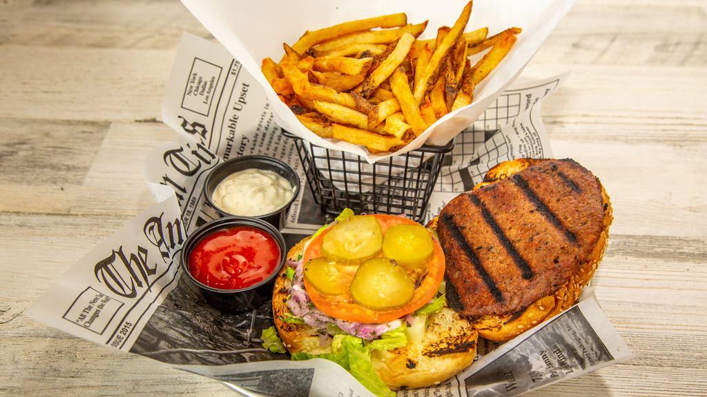 Impossible Burger · Vegetarian Impossible Burger. Lettuce, tomatoes and onion served with fries.