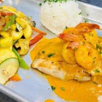 Caribbean Grouper · Grilled fillet, topped with our Caribbean shrimp sauce. Served with 1 side.