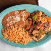 El Paisano · Your choice of steak or a grilled chicken breast with shrimp, mushrooms, onions, bell pepper...