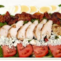 Cobb Salad · Homemade chicken breast, bacon, mix greens, tomato, boil egg and blue cheese crumbles.