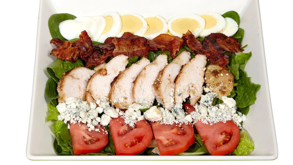 Cobb Salad · Homemade chicken breast, bacon, mix greens, tomato, boil egg and blue cheese crumbles.