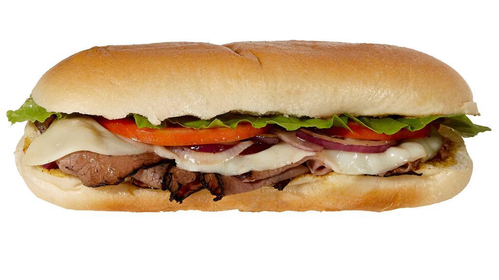 Prime Roast Beef · Hot or cold. Spicy mustard, grilled onions, provolone, mix greens, tomato.