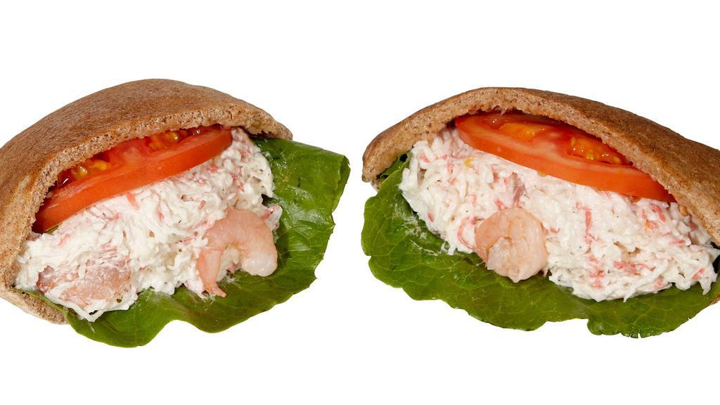 Seafood Sandwich · Krab and shrimp, mixed with light mayo, mix greens, tomato.