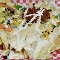 Route 66 · New! Tortilla chips, smoked chicken, lettuce black beans and corn, J's green sauce, queso sa...
