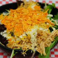 Island Salad · Smoked chicken, black beans and corn cheese blend, crushed nacho cheese, Doritos.