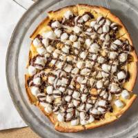S'Mores · Sweet Bavarian cream on tender baked pie shell and then topped with marshmallows, graham cra...