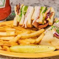 Denise'S Club Sandwich · Ham, turkey and bacon, lettuce, tomato, mayo.