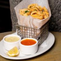 Fried Calamari · Golden fried calamari / san marzano basil pomodoro / aji amarillo aioli