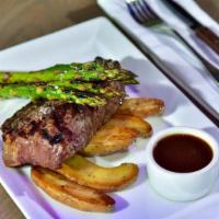 Ny Strip Steak · Roasted fingerling potatoes / grilled asparagus / red wine demi-glaze
