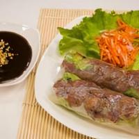 A2 - Thit Nuong Cuon · BBQ grilled pork mixed with vermicelli rice noodles, lettuce, bean sprouts, and wrapped in r...