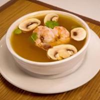 Ss1 - Tom Yum · Your choice of either chicken or seafood with white mushroom and cilantro in a spicy and tan...
