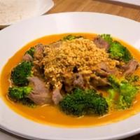 Ad12 - Rama Curry Dinner · Your choice of meat simmered in a spicy peanut-based and coconut milk curry with steamed bro...