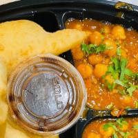 Channa Bhatura · Chole stands for spicy curry made with white chickpea and bhature is fried leavened flat bre...