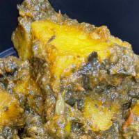 Alu Saag · Spinach cooked with potatoes.