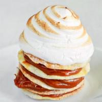 Rogel · Vegetarian. Filled with dulce de leche. Merengue on top.