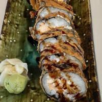 Japanese Bagel Tempura · Salmon and cream cheese whole roll tempura.