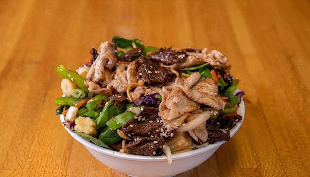 Beef And Chicken Bowl · The original Mongolian BBQ bowl with our house sauce. Please let us know about any allergies.