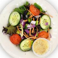 Garden Salad · Mixed Greens, Tomatoes, Cucumbers, Bermuda Onions, Green Peppers, Shredded Carrots, Balsamic...