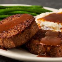 Iron City Meatloaf · Our famous griddle-seared meatloaf with rich brown gravy, creamy mashed potatoes and steamed...