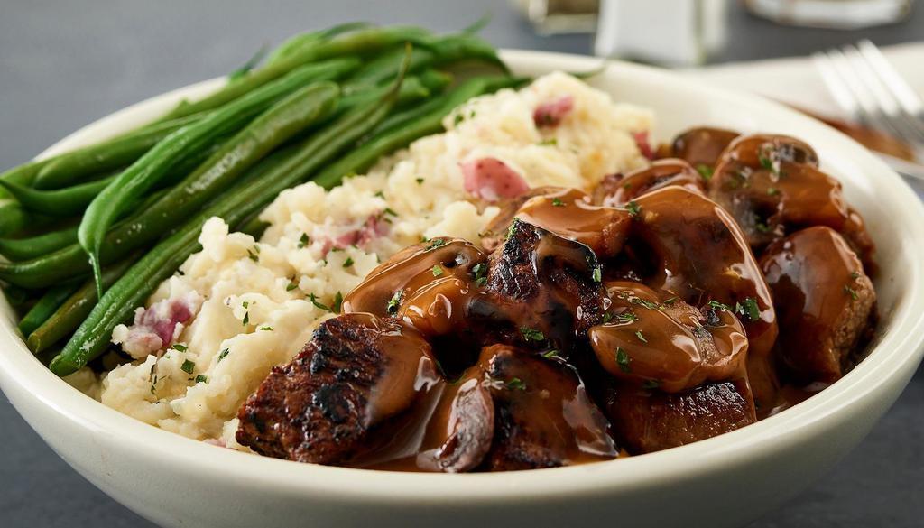 Steak Tips · Seasoned and seared beef tips in our mushroom gravy with creamy mashed
potatoes and steamed green beans.