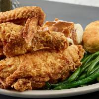 Fried Chicken Plate · Half a fried chicken, creamy mashed potatoes with a rich brown gravy, steamed green beans an...
