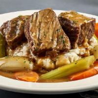 Pot Roast · Seasoned and slow-cooked with tender carrots, celery and onions in our rich
brown gravy over...