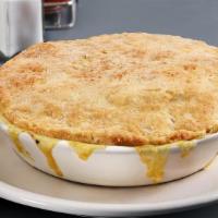 Chicken Pot Pie · Tender chicken, carrots, celery and corn
in our velvety cream sauce and topped
with our orig...