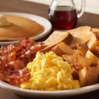 The Bissell Breakfast* · Two eggs any style, bacon, toast, hashbrowns or grits, and a short stack of pancakes.