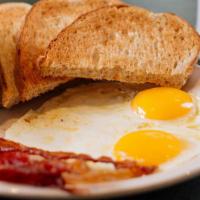 Two Egg Breakfast · Two eggs any style, hashbrowns, toast and your choice of meat: bacon, sausage patties, sausa...