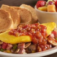 Western Omelet · Ham, cheddar cheese, mushrooms, onions, tomatoes and peppers, topped with salsa. Served with...