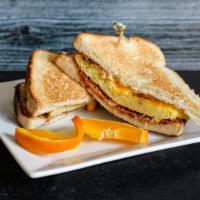 Breakfast Sandwich · Hickory smoked bacon, eggs, sharp cheddar cheese, and mayo on toasted oatmeal bread.