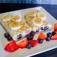 Berries And Cream Panini (V) · Vegan Cream Cheese, Fresh Strawberries and Blueberries, pressed in a flour wrap and topped w...
