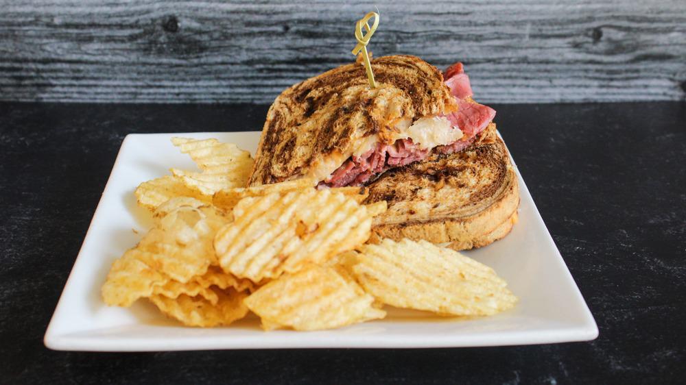 Classic Reuben · Steamed roast beef, sauerkraut, provolone cheese, 1000 island dressing on marble rye. With a side of chips or fruit.