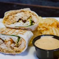 Southwest Chicken Wrap · All white meat chicken, shredded cheddar-jack cheese blend, spring mix, and tomatoes grilled...