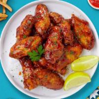 Smokin' Honey Wings  · Fresh chicken wings breaded, fried until golden brown, and tossed in honey and barbecue sauc...