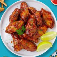 Bbq Bonus Wings  · Fresh chicken wings breaded, fried until golden brown, and tossed in spicy barbecue sauce. S...