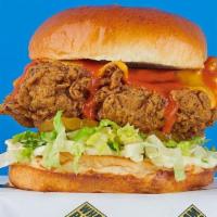Buffalo Hero Chicken Sandwich · Getting heroic with Bangin' Buffalo sauce, mayo, lettuce, pickles and cheese.