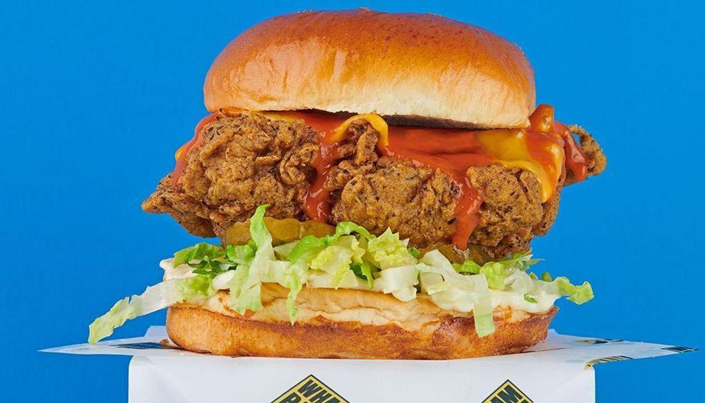 Buffalo Hero Chicken Sandwich · Getting heroic with Bangin' Buffalo sauce, mayo, lettuce, pickles and cheese.