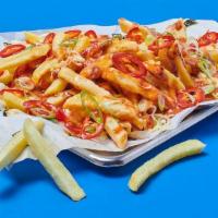 Smoky Chipotle Loaded Fries · Golden fries covered in cheese sauce, loaded up with spring onion, crispy onion, and smoky c...