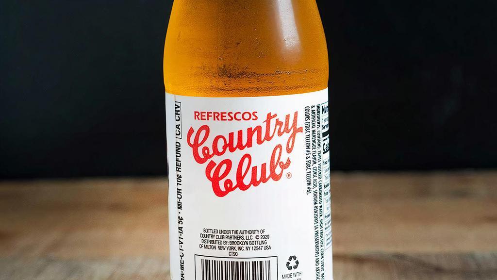 Country Club · Refresco dominicano. Merengue, rojo. / Dominican soda. Meringue, red.