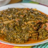 Epinard · Stew beef chunks cooked with spinach, onions and garlic.