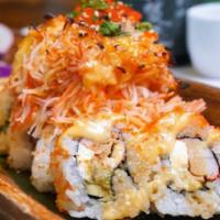 Volcano Roll · California roll topped with baked spicy crab and crunch.