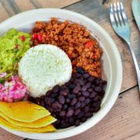 Mexican Bowl · Vegan ground meat, white rice, black beans, guacamole, pico de gallo, soft tortilla.