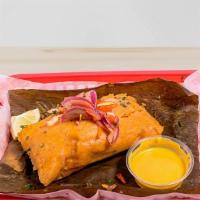 Peruvian Tamales - Pork/Chicken · Marinated in lime juice, cilantro and red onions served with sweet potato and Peruvian corn.