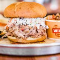 Slawpy Pig · Heaping pile of pulled pork topped with coleslaw.