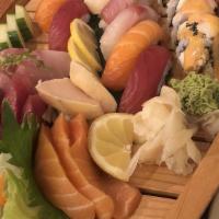 Sushi & Sashimi Combo · Tuna Roll 7pcs Nigiri Sushi & 7 pcs Sashimi.

*The consumption of raw or undercooked meat, p...