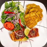 Grilled Salmon/ Salmon A La Plancha · Served with two sides (rice, salad, tostones, or French fries).