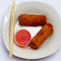 Egg Roll (2 Pieces) · Inside has shredded cabbage, chopped pork, and carrots wrapped in wheat flour skin and fried...
